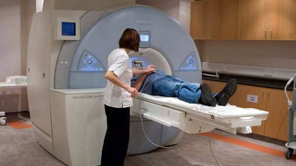 Doctor performing a scan